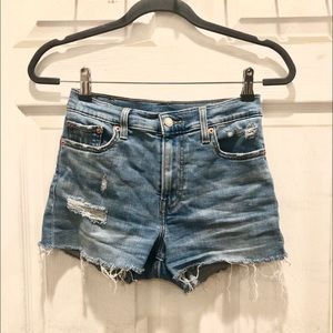 LEVI’S light wash high rise distressed shorts